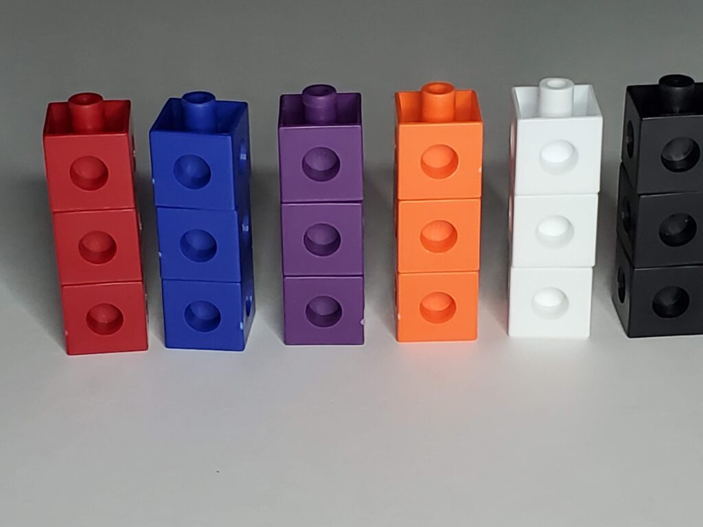 Connecting cubes in five towers of three